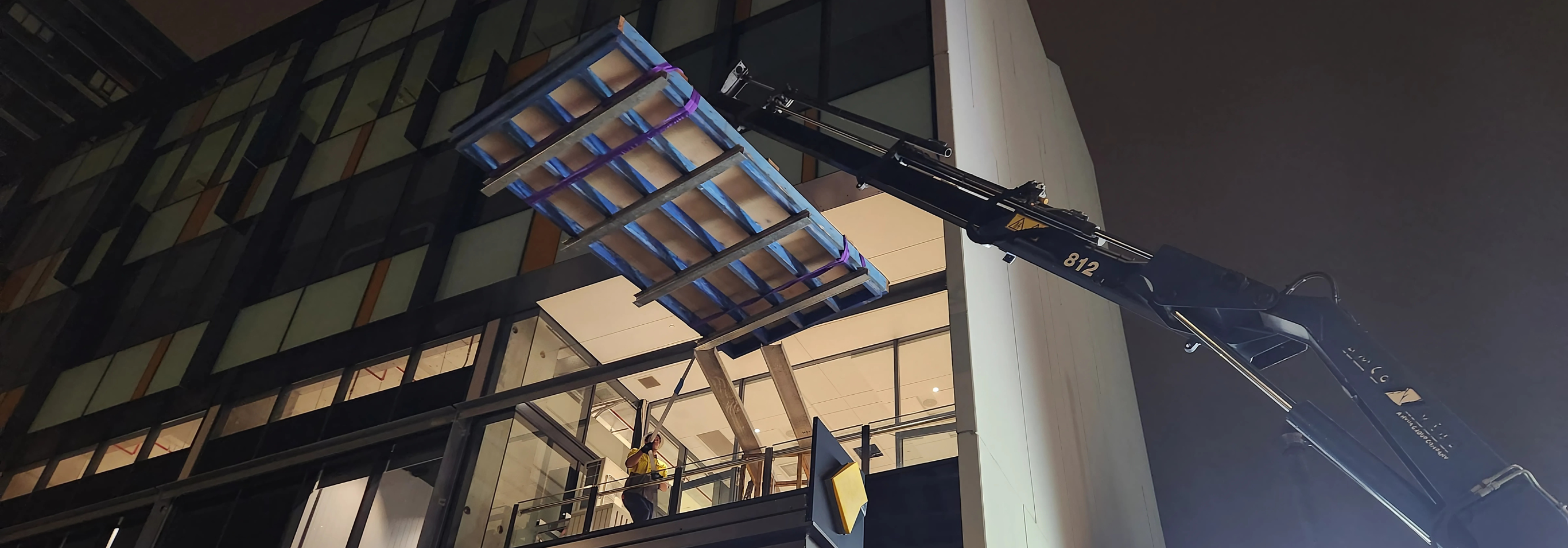 Board room office table craned into corporate building